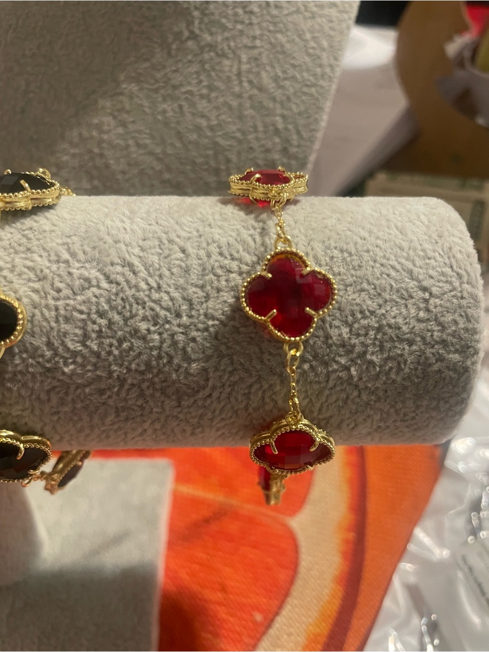 Gold Bracelet with Red Clover-Link Stones